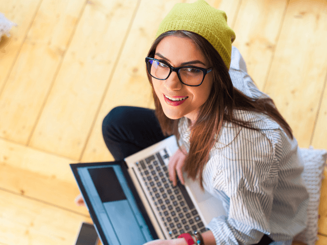 Ways Blogger Stand out in the crowd. Woman working on computer.